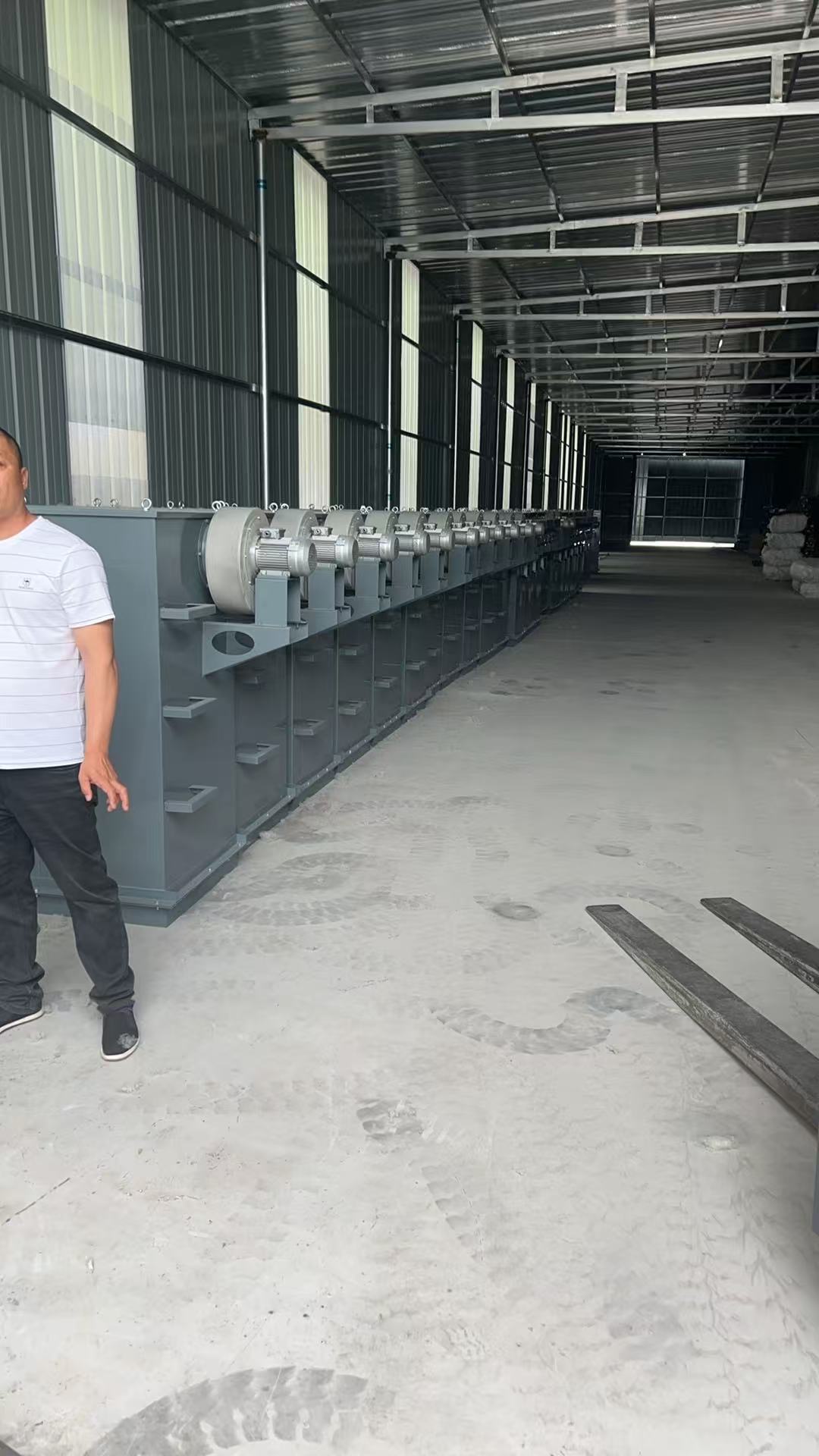 Batch produced bag dust collectors in workshop